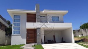 Porta pivotante com bandeira e painéis fixos de Lambril de Cedro - Imagem 3