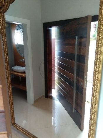 Porta pivotante de Lambril de Imbuia com estrutura de aço no interior para não empenar 8 cm de espessura - Imagem 7