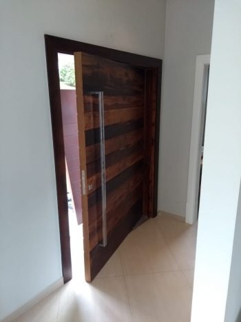 Porta pivotante de Lambril de Imbuia com estrutura de aço no interior para não empenar 8 cm de espessura - Imagem 8