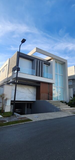 Porta pivotante em ACM com painéis fixos e puxador cava especial - Imagem 3